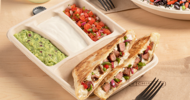 A Carne Asada Quesadilla from Chipotle with a side of Guacamole, Sour Cream, and Fresh Tomato Salsa.